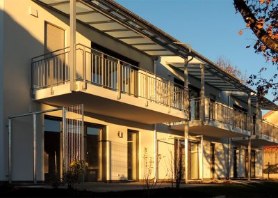 Mehrfamilienhaus Inning im Sonnenuntergang